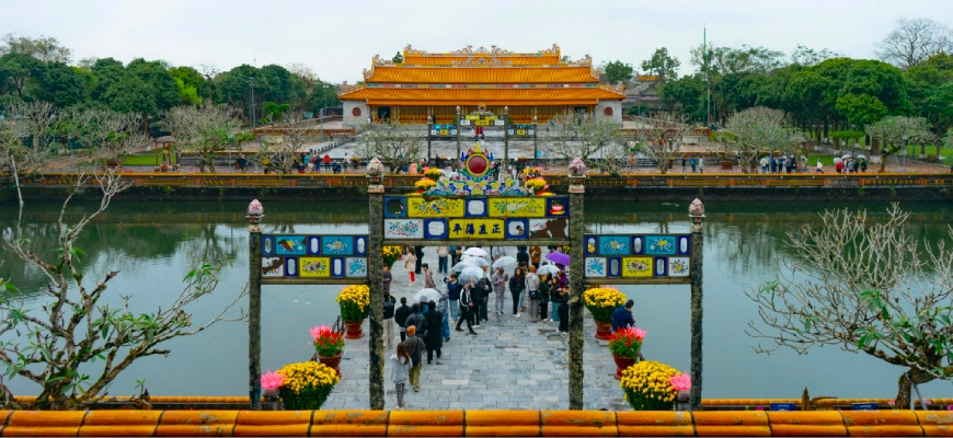 A vegan tour group enjoying a visit to the Forbidden Palace in Hue, Vietnam