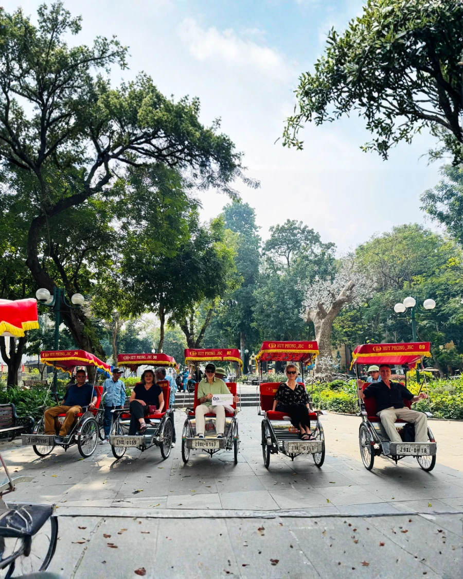 Our vegan group enjoying a cyclo tour around the lake-in Hanoi