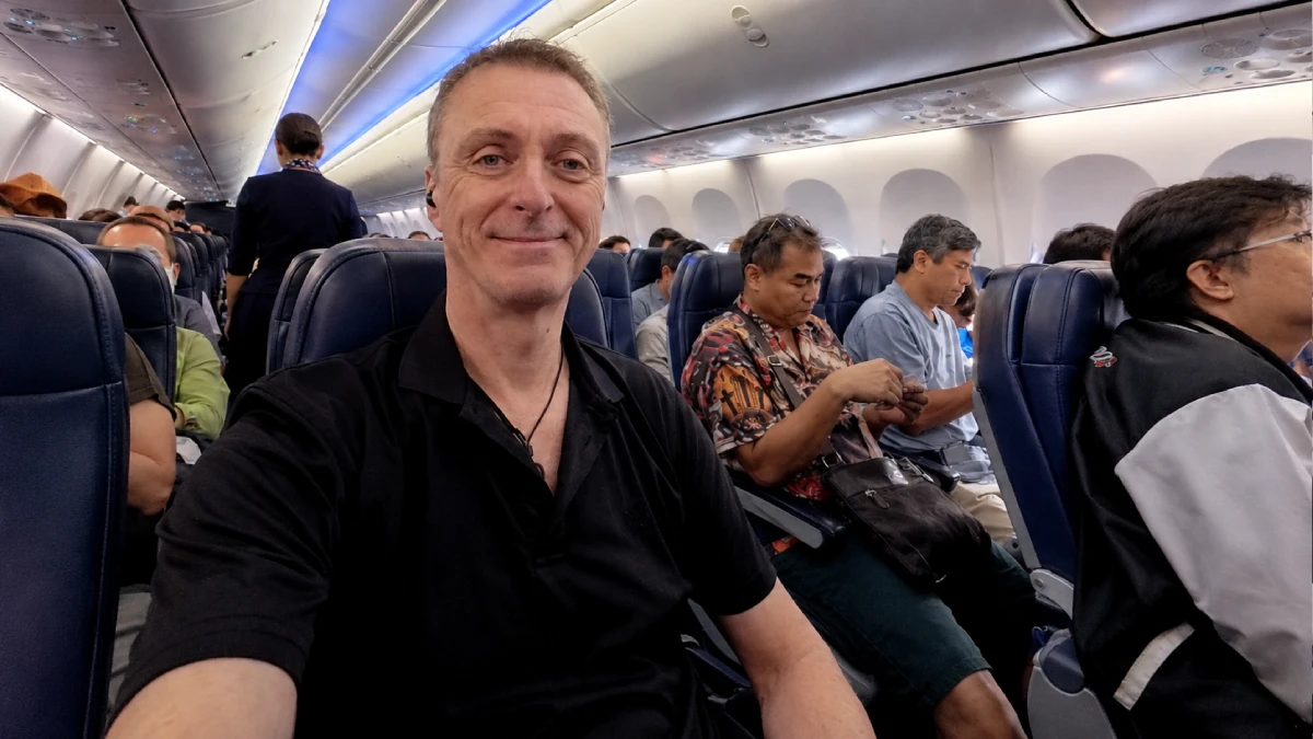 Martin sitting on a plane before a flight